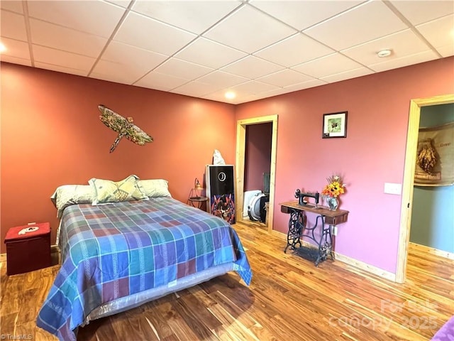 658 Green Point Ln, Boomer, NC 28606 - bedroom featuring wood finished floors and a paneled ceiling