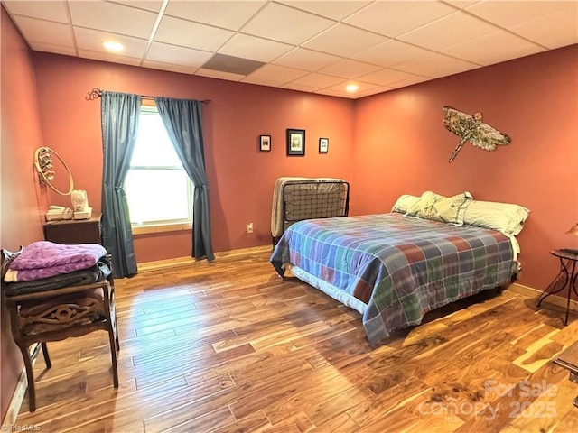 658 Green Point Ln, Boomer, NC 28606 - bedroom with wood finished floors and a drop ceiling