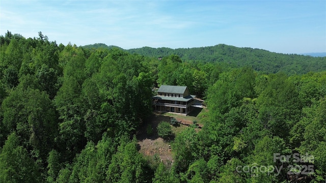 658 Green Point Ln, Boomer, NC 28606 - aerial view of property and surrounding area featuring a heavily wooded area