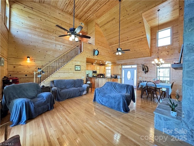 658 Green Point Ln, Boomer, NC 28606 - living room featuring high vaulted ceiling, ceiling fan, stairway, light wood-style floors, and wooden ceiling