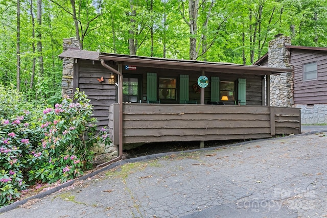 37 Sassafras Ln, Maggie Valley, NC 28751 - view of front of house featuring a chimney