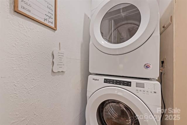 37 Sassafras Ln, Maggie Valley, NC 28751 - washroom with stacked washer and clothes dryer