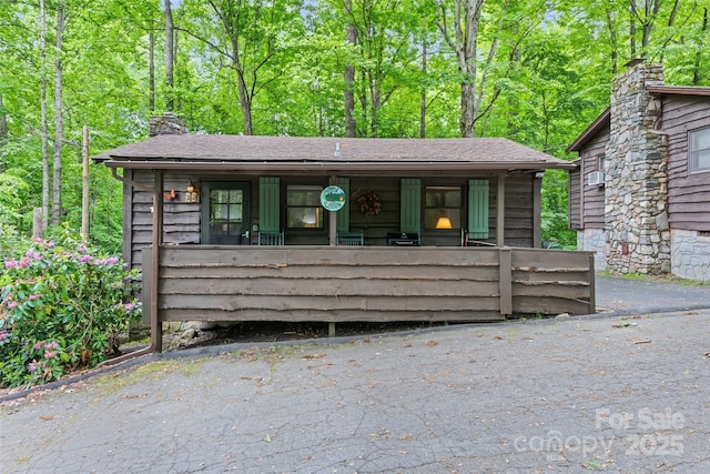 37 Sassafras Ln, Maggie Valley, NC 28751 - view of front of house featuring a chimney