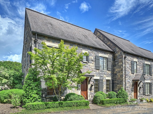 1522 High St, Charlotte, NC 28211 - view of front of house featuring stone siding and a shingled roof