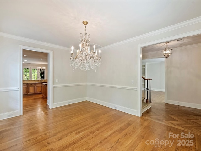 1522 High St, Charlotte, NC 28211 - unfurnished dining area featuring a chandelier, crown molding, baseboards, light wood-style floors, and stairway