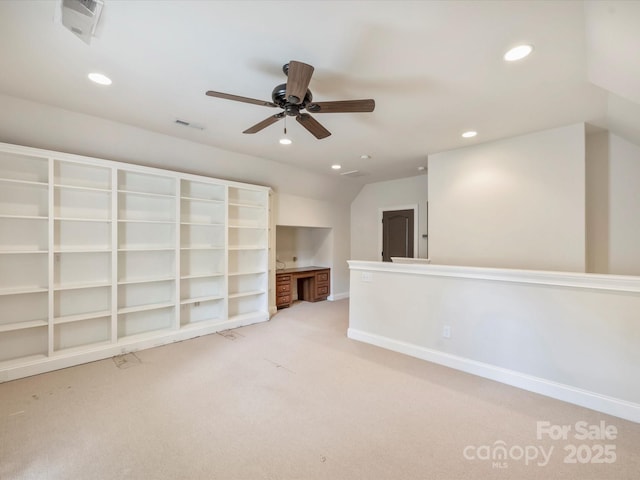 1522 High St, Charlotte, NC 28211 - empty room with light colored carpet, recessed lighting, a ceiling fan, vaulted ceiling, and baseboards