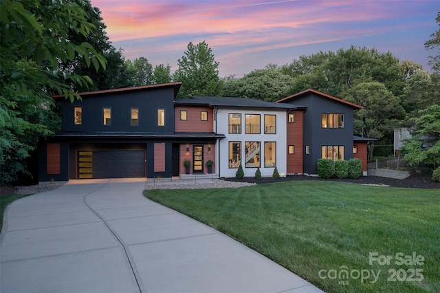 5925 Creola Rd, Charlotte, NC 28270 - contemporary house featuring an attached garage and driveway