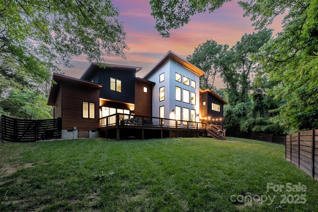 5925 Creola Rd, Charlotte, NC 28270 - back of house at dusk with a wooden deck