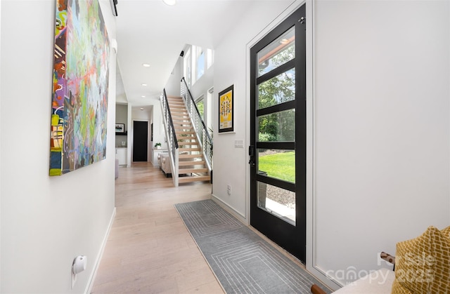 5925 Creola Rd, Charlotte, NC 28270 - entrance foyer featuring baseboards, light wood-style floors, recessed lighting, and stairway