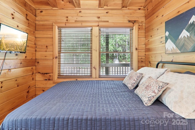 145 Jobes Trl, Mill Spring, NC 28756 - bedroom featuring wood walls, access to outside, and beam ceiling