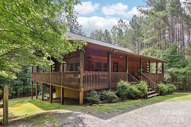 145 Jobes Trl, Mill Spring, NC 28756 - log home featuring stairs and a porch