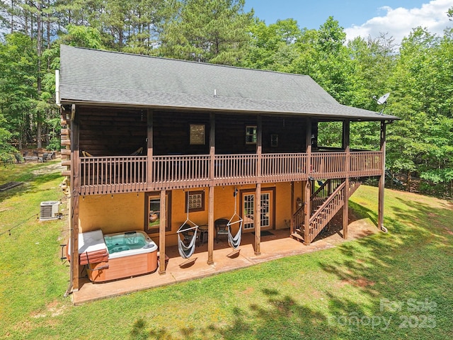 145 Jobes Trl, Mill Spring, NC 28756 - rear view of property featuring a hot tub, french doors, a yard, and a patio