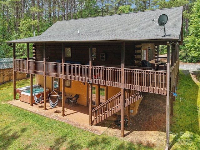 145 Jobes Trl, Mill Spring, NC 28756 - back of house with log siding, a patio area, a deck, stairway, and a lawn