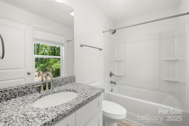 208 N Correll St, Landis, NC 28025 - bathroom with toilet, vanity, and shower / bathtub combination