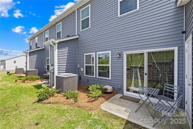 1563 Old Rivers Rd, Concord, NC 28027 - back of property with central AC and a yard