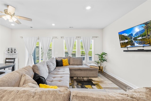 1563 Old Rivers Rd, Concord, NC 28027 - living room featuring wood finished floors, baseboards, recessed lighting, and ceiling fan