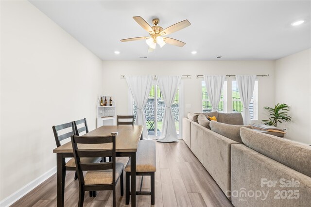 1563 Old Rivers Rd, Concord, NC 28027 - dining space with plenty of natural light, light wood-style floors, ceiling fan, recessed lighting, and baseboards