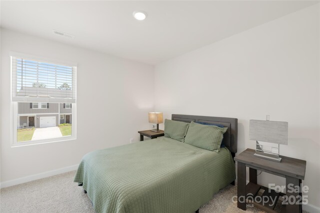 1563 Old Rivers Rd, Concord, NC 28027 - bedroom with baseboards and carpet