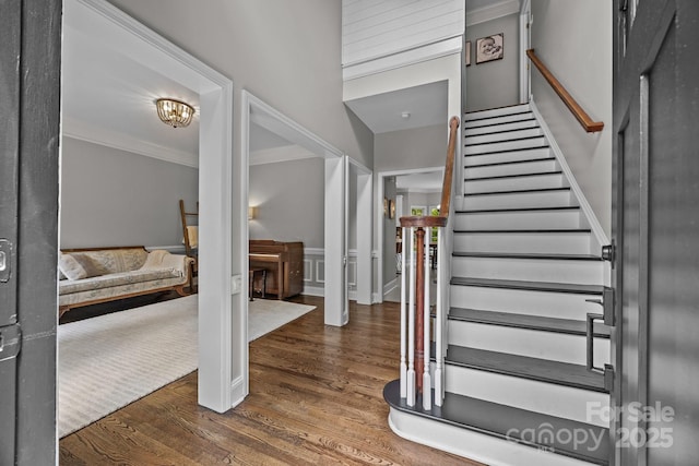 16028 Cranleigh Dr, Huntersville, NC 28078 - foyer entrance featuring wood finished floors, crown molding, and stairway