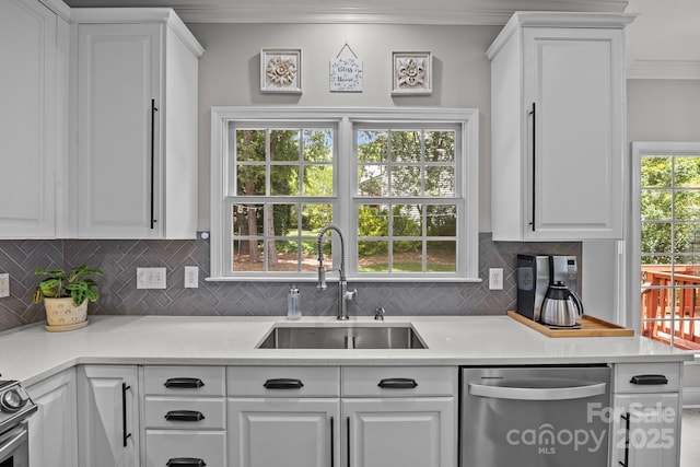 16028 Cranleigh Dr, Huntersville, NC 28078 - kitchen featuring dishwasher, a sink, crown molding, decorative backsplash, and white cabinets