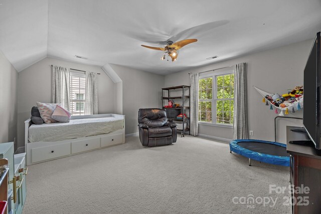 16028 Cranleigh Dr, Huntersville, NC 28078 - carpeted bedroom featuring multiple windows, a ceiling fan, vaulted ceiling, and baseboards