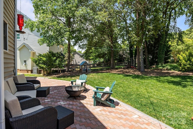 16028 Cranleigh Dr, Huntersville, NC 28078 - view of patio with an outdoor fire pit