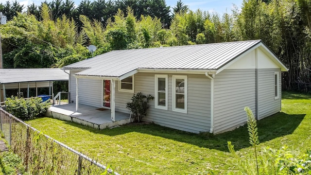 13 Rosscraggon Dr, Asheville, NC 28803 - view of front facade with a deck and a metal roof