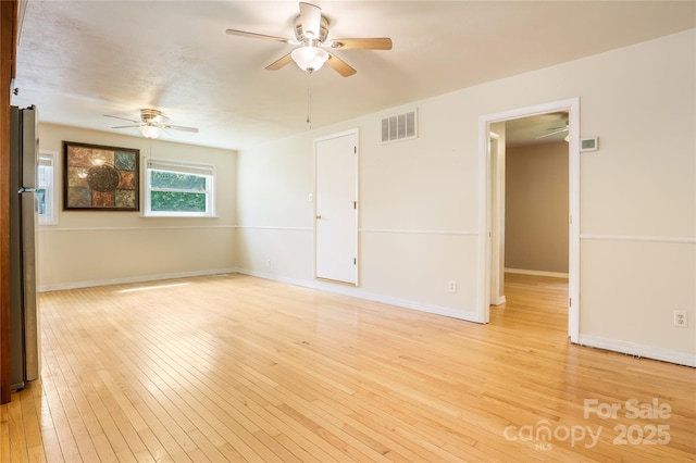 13 Rosscraggon Dr, Asheville, NC 28803 - unfurnished room featuring ceiling fan and light wood-type flooring