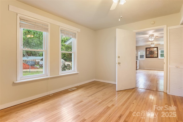 13 Rosscraggon Dr, Asheville, NC 28803 - empty room featuring a ceiling fan and light wood-style floors