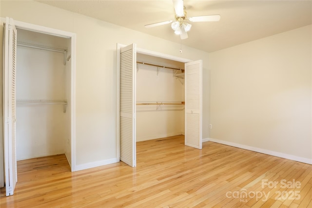 13 Rosscraggon Dr, Asheville, NC 28803 - unfurnished bedroom with wood finished floors and ceiling fan