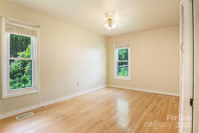 13 Rosscraggon Dr, Asheville, NC 28803 - spare room featuring light wood-style flooring and ceiling fan