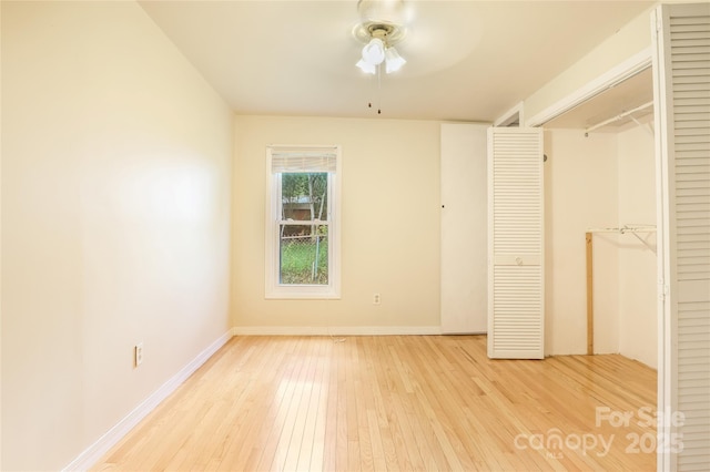 13 Rosscraggon Dr, Asheville, NC 28803 - unfurnished bedroom featuring light wood-style floors, a closet, and a ceiling fan