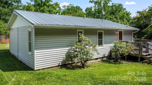 13 Rosscraggon Dr, Asheville, NC 28803 - view of side of property with a yard, a metal roof, and a deck