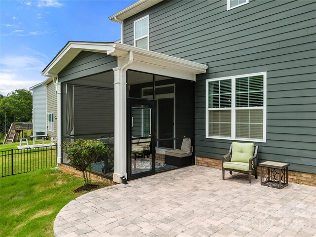 3009 Lydney Cir, Waxhaw, NC 28173 - view of patio with a sunroom