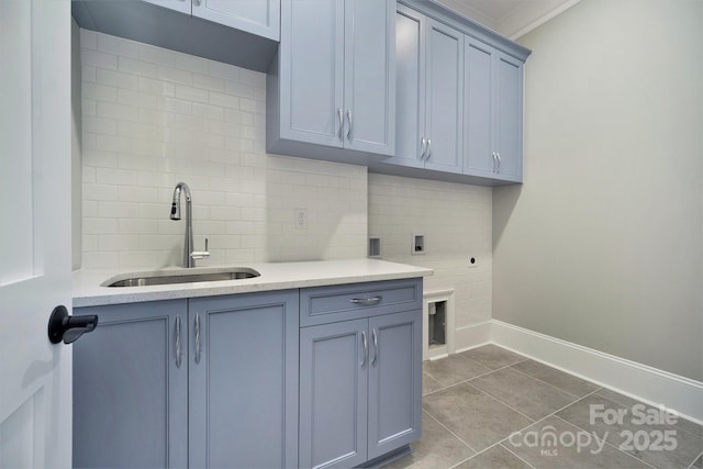 7215 Alexander Rd Unit 4, Charlotte, NC 28270 - laundry area featuring cabinet space, baseboards, dark tile patterned floors, hookup for an electric dryer, and crown molding