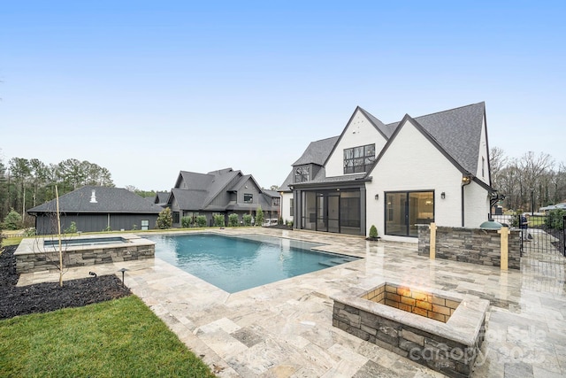 7215 Alexander Rd Unit 4, Charlotte, NC 28270 - view of pool with a sunroom, an outdoor fire pit, a patio area, and a pool with connected hot tub