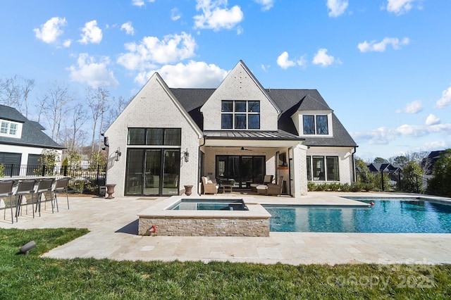 7215 Alexander Rd Unit 4, Charlotte, NC 28270 - rear view of property featuring a patio, brick siding, an outdoor pool, an in-ground hot tub, and a ceiling fan