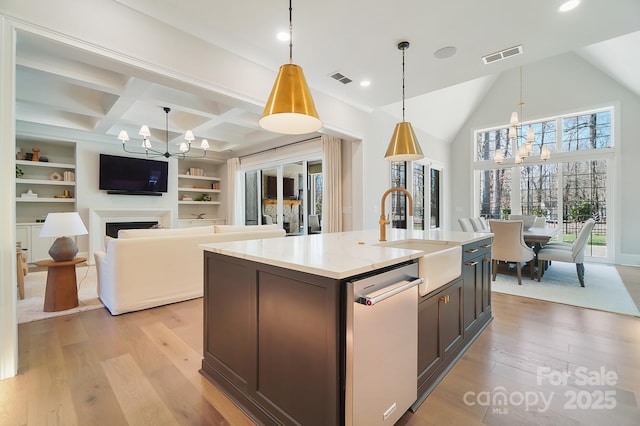 7215 Alexander Rd Unit 4, Charlotte, NC 28270 - kitchen with a sink, dishwasher, a chandelier, light wood finished floors, and recessed lighting