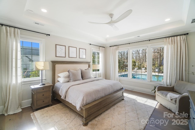 7215 Alexander Rd Unit 4, Charlotte, NC 28270 - bedroom featuring baseboards, a tray ceiling, recessed lighting, ceiling fan, and light wood finished floors