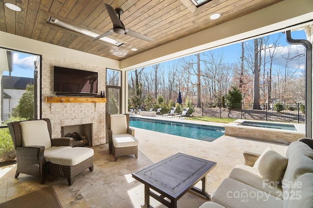 7215 Alexander Rd Unit 4, Charlotte, NC 28270 - view of patio / terrace with an in-ground hot tub, a ceiling fan, and an outdoor living space with a fireplace