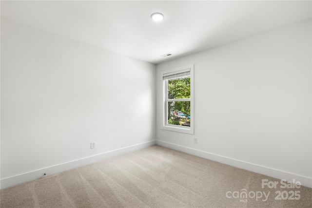 210 N Correll St, Landis, NC 28025 - empty room with carpet flooring and baseboards