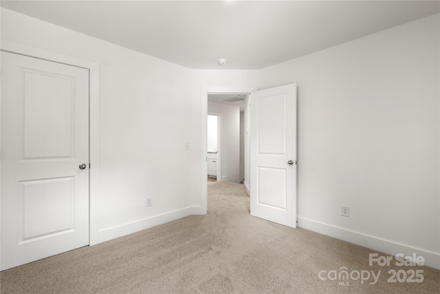 210 N Correll St, Landis, NC 28025 - spare room with light colored carpet and baseboards