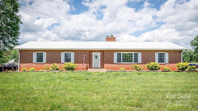 765 York Institute Rd, Hiddenite, NC 28636 - ranch-style house featuring brick siding, a chimney, and a front lawn