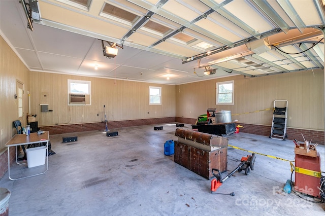 765 York Institute Rd, Hiddenite, NC 28636 - garage with a garage door opener and wooden walls