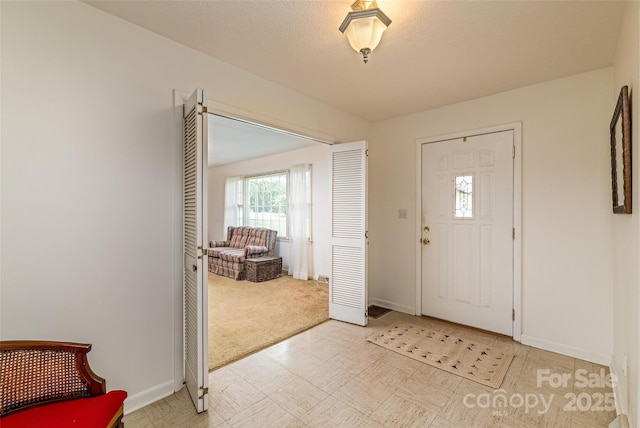765 York Institute Rd, Hiddenite, NC 28636 - foyer entrance with baseboards and light floors