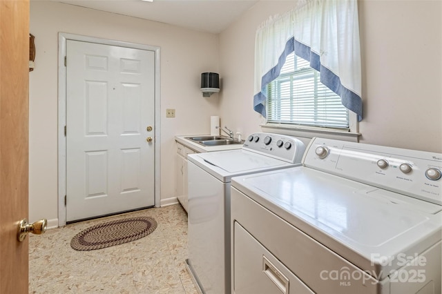 765 York Institute Rd, Hiddenite, NC 28636 - washroom with independent washer and dryer, cabinet space, and baseboards