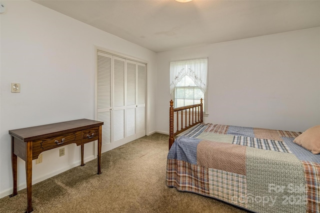 765 York Institute Rd, Hiddenite, NC 28636 - carpeted bedroom with a closet and baseboards