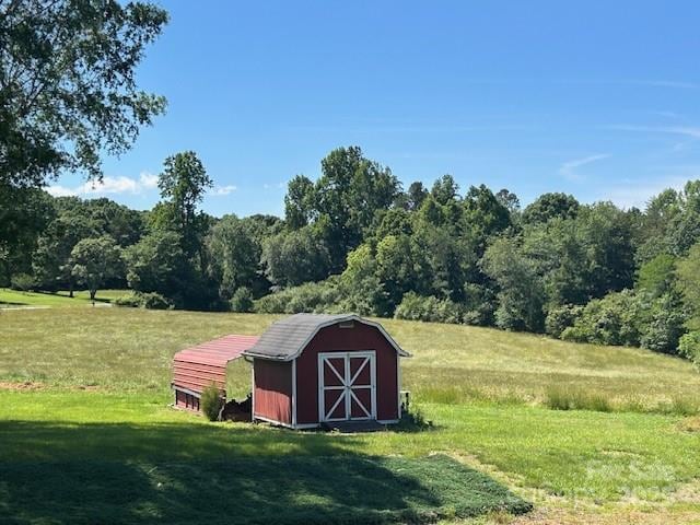 765 York Institute Rd, Hiddenite, NC 28636 - view of shed featuring a forest view
