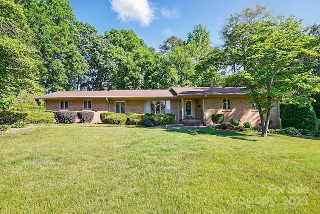 308 Odell St, Kannapolis, NC 28083 - single story home featuring a front yard and brick siding