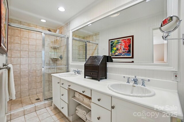 308 Odell St, Kannapolis, NC 28083 - full bath featuring tile patterned flooring, a stall shower, double vanity, and recessed lighting